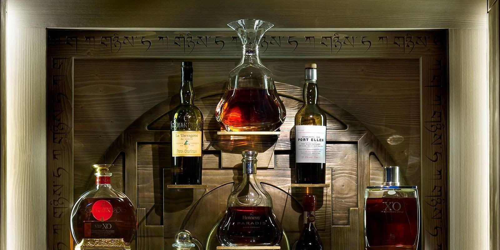 Hotel Le K2 Palace Courchevel Les 3 Vallees Frankrijk wintersport skivakantie luxe drank flessen Port Ellen Hennessy Paradis XO cognac