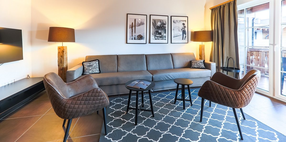 Penthouses Avenida Mountain Resort Kaprun Zell am See-Kaprun Oostenrijk wintersport skivakantie luxe living bank fauteuils penthouse B25